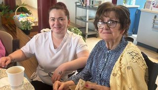 A healthcare worker and a patient in Ballyshannon Community Hospital
