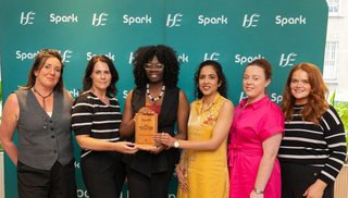 A group of women holding an award that reads 'HSE Bright Spark Award 2026'.