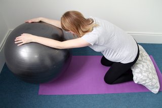 You can do the child's pose stretch with a gym ball.