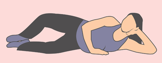 An illustration of a pregnant woman lying on her side. One hand is holding her head up, another hand is on the floor in front of her tummy, and her knees are spread apart while her feet are together.