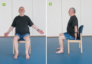 man sitting and stretching arms out to the side
